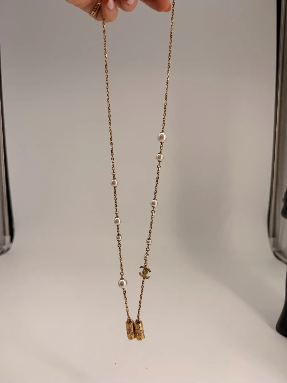 CHANEL Metal Crystal Pearl Airpod Necklace Gold